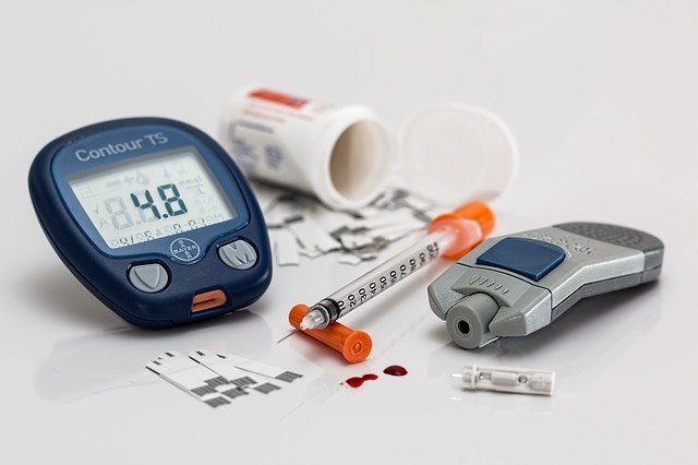 glucometer and insulin needle