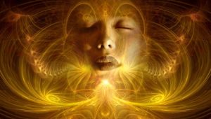 spiritual womans face shimmered in gold